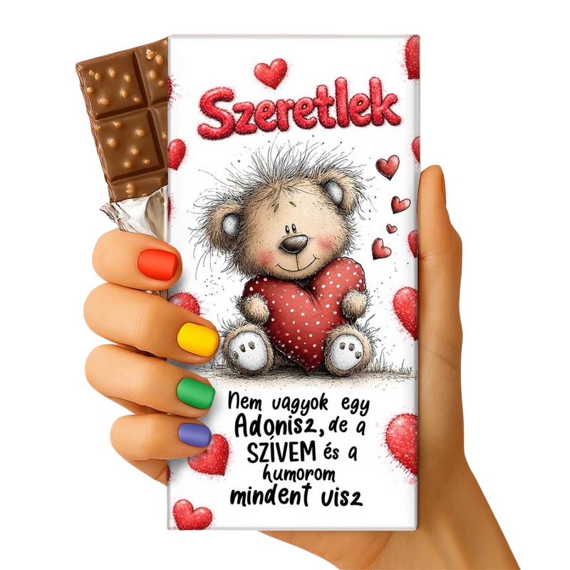 Valentin csoki tábla maci szívvel mintával, felirat: Szeretlek. Nem vagyok egy Ádonisz, de a szívem és a humorom mindent visz.